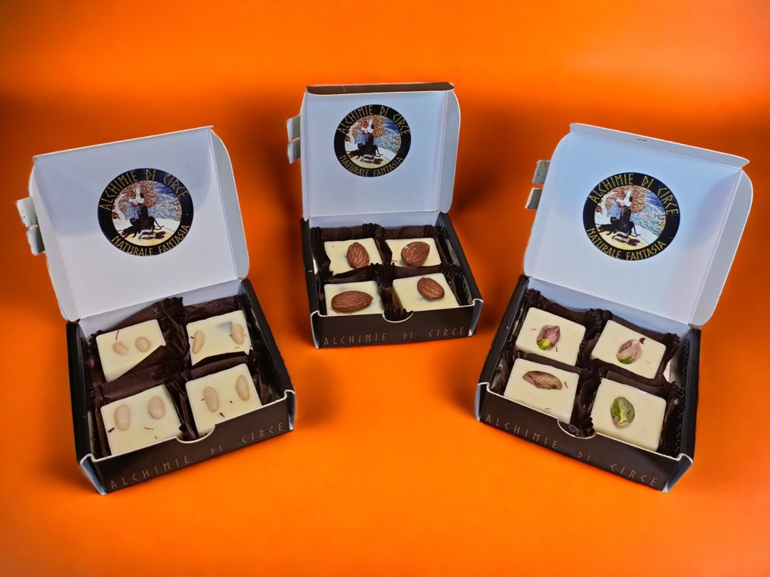 Chocolates blancos de azafrán, kumquat y piñones 85g