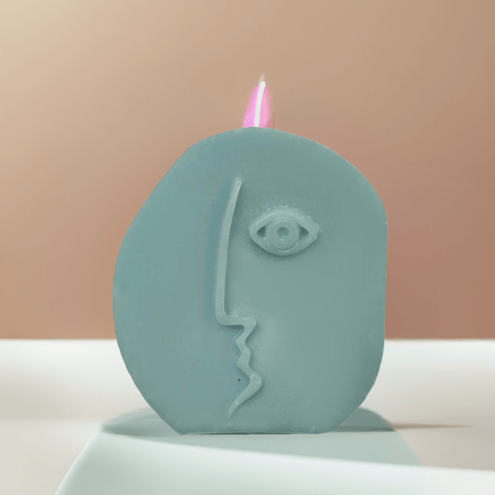 Candela decorativa volto soggetto casuale 75g Hierba Buena