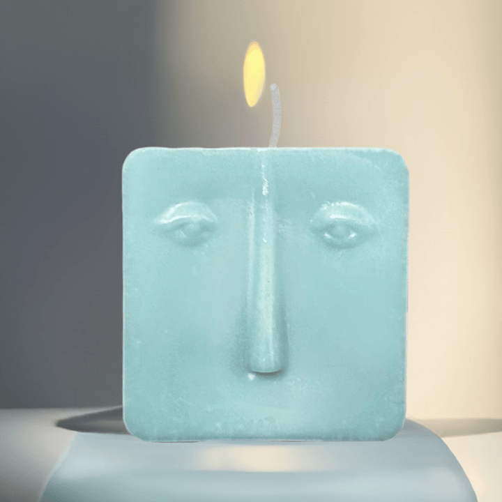 Candela decorativa volto soggetto casuale 75g Hierba Buena